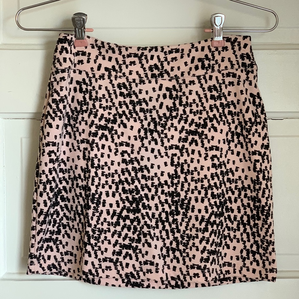 Nude and black skirt
